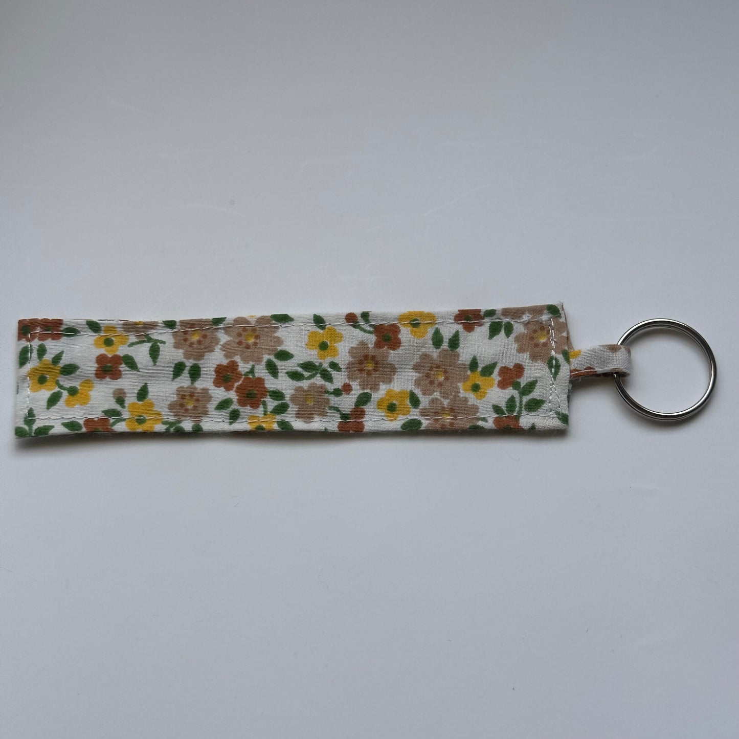 Porte Clé Fleurs Marron