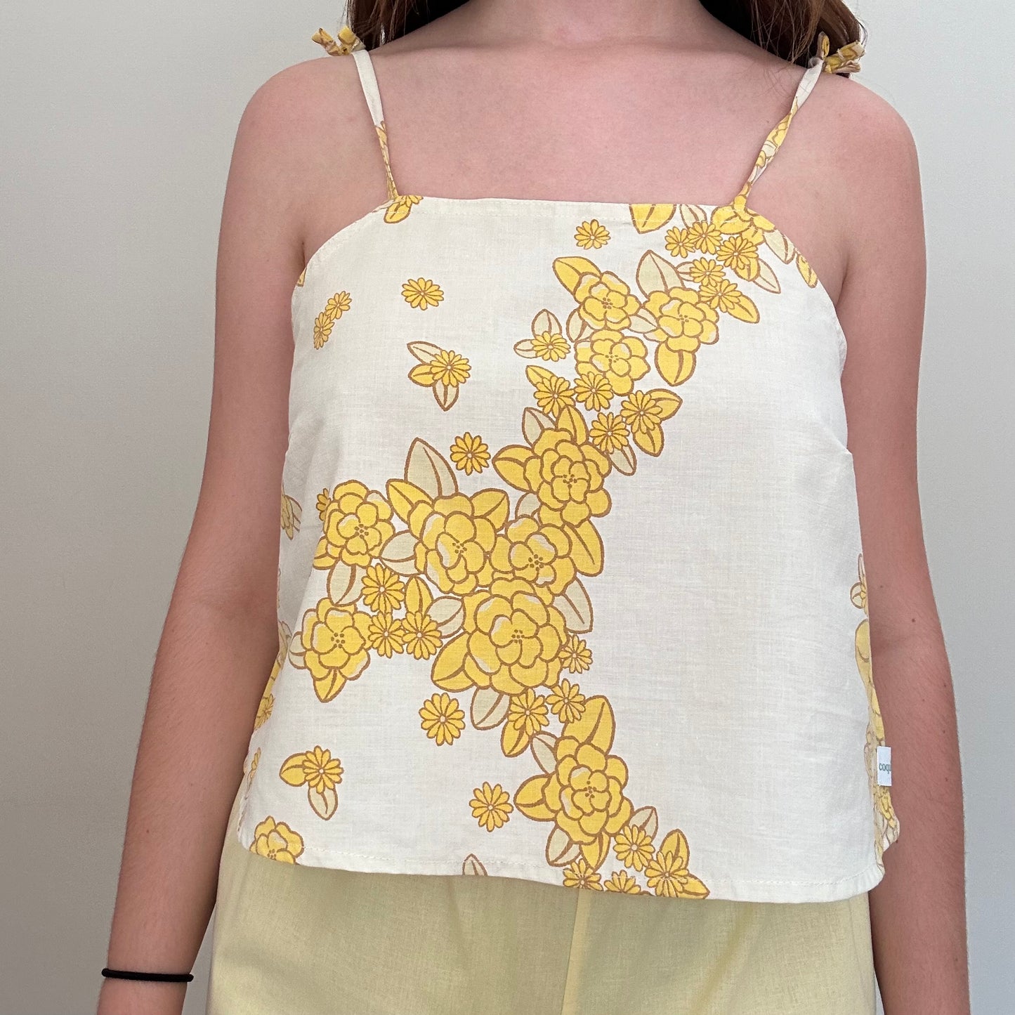 Top Blanc Fleurs Jaune