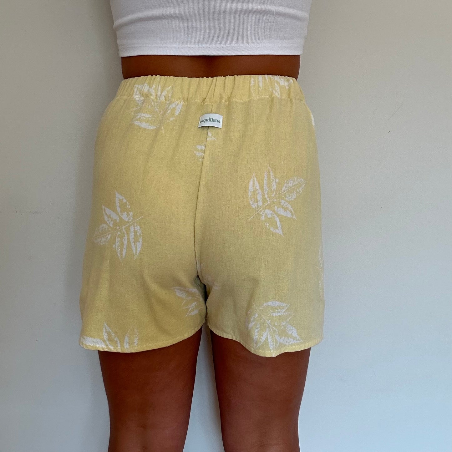 Short Jaune Fleurs Blanche