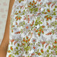Haut Bouton Fleurs
